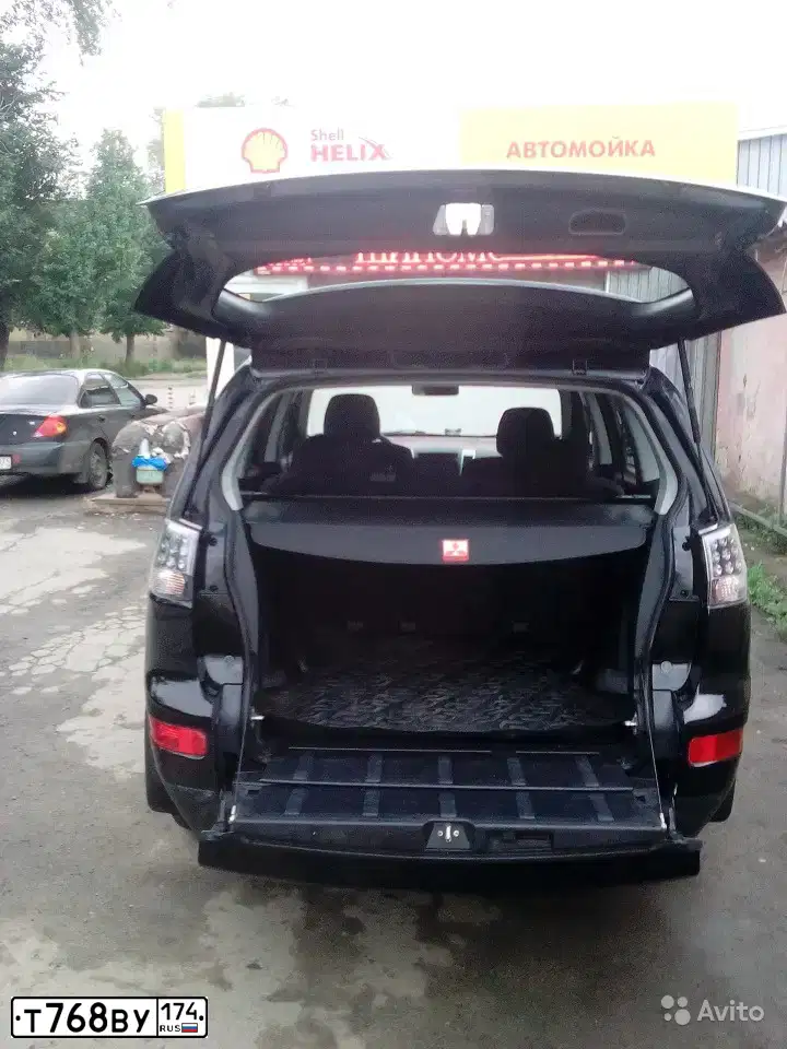 Фото автомобиля MITSUBISHI OUTLANDER, 2008 — госномер С344КЕ774. Цвет: ЧЕРНЫЙ