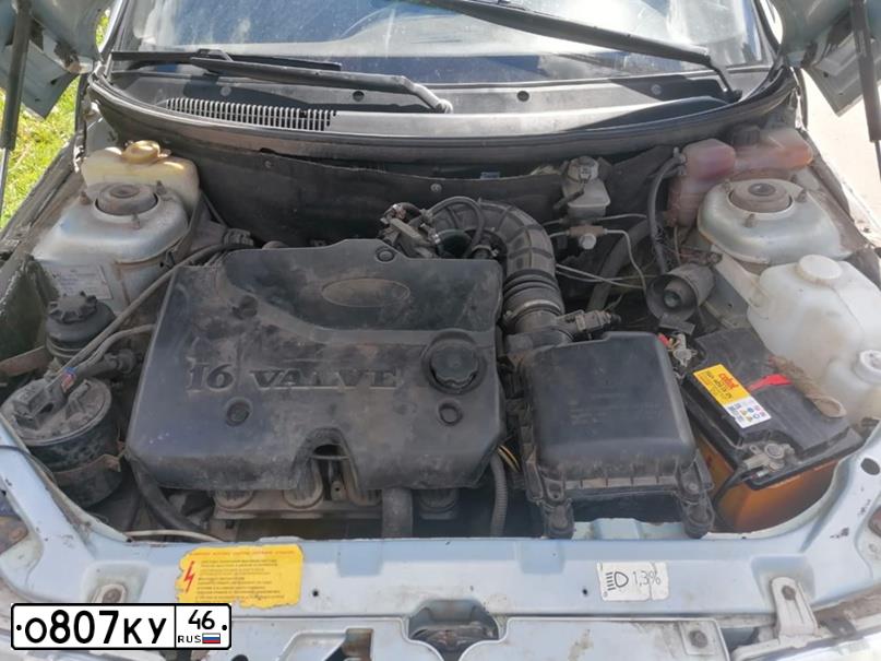 Фото автомобиля LADA 2112 LADA, 2007 — госномер О406ЕВ46. Цвет: Серебристо-желто-голубой