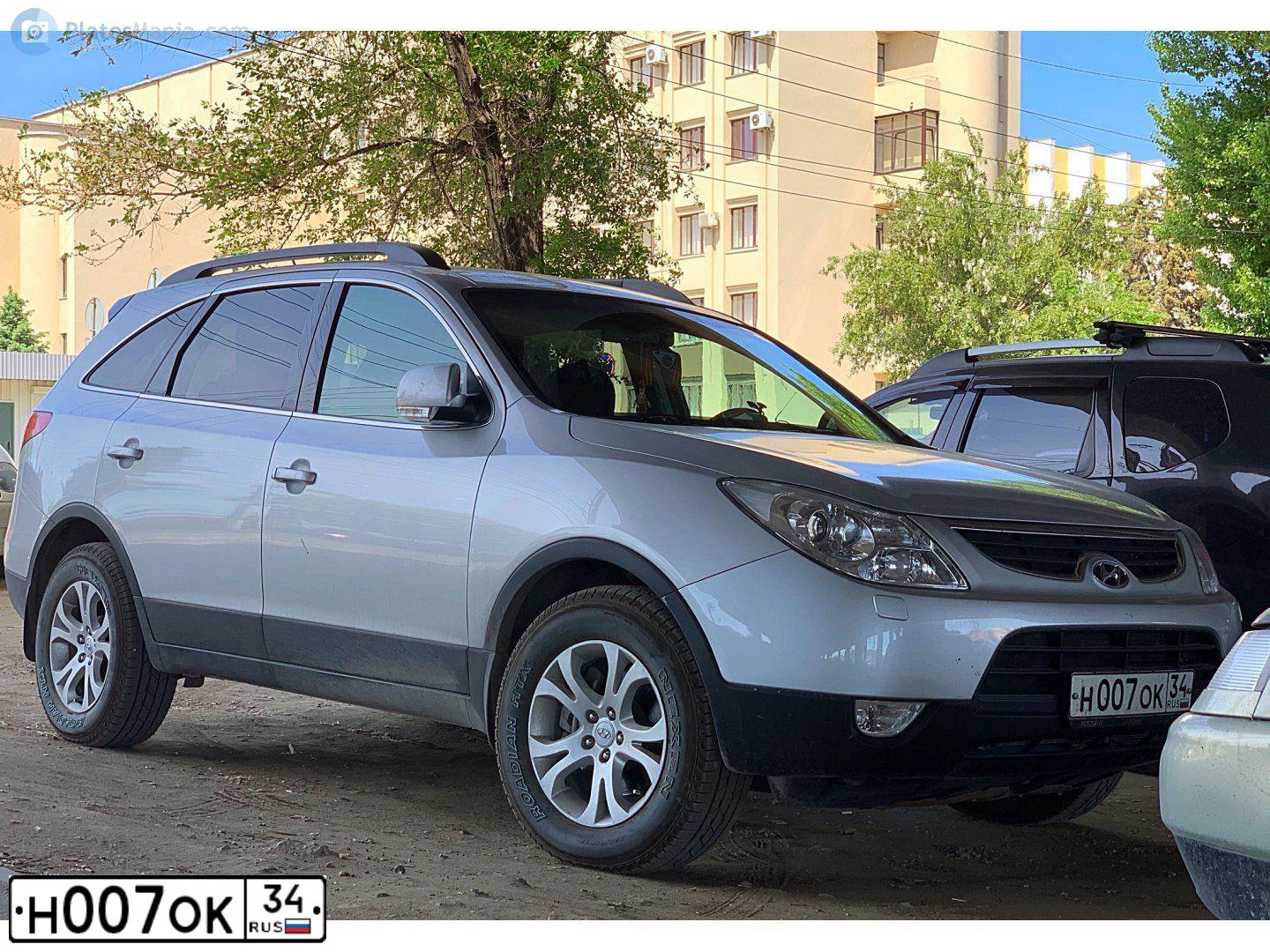 Фото автомобиля HYUNDAI TUCSON, 2008 — госномер Н007ОК34. Цвет: ТЕМНО ЗЕЛЕНЫЙ