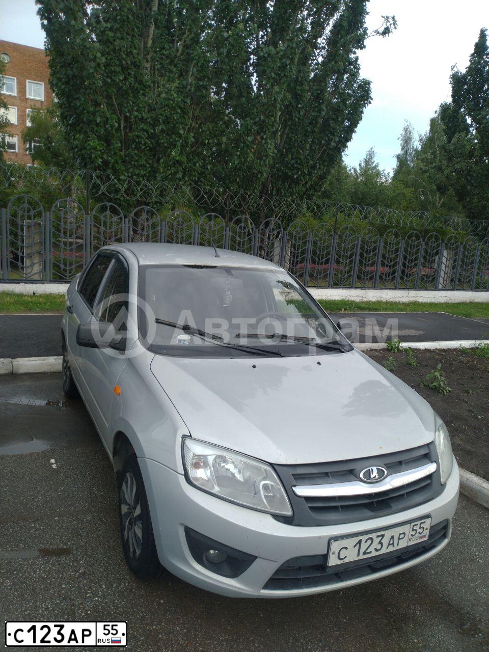 Фото автомобиля LADA 2190 GRANTA, 2015 — госномер С123АР55. Цвет: Серебристый