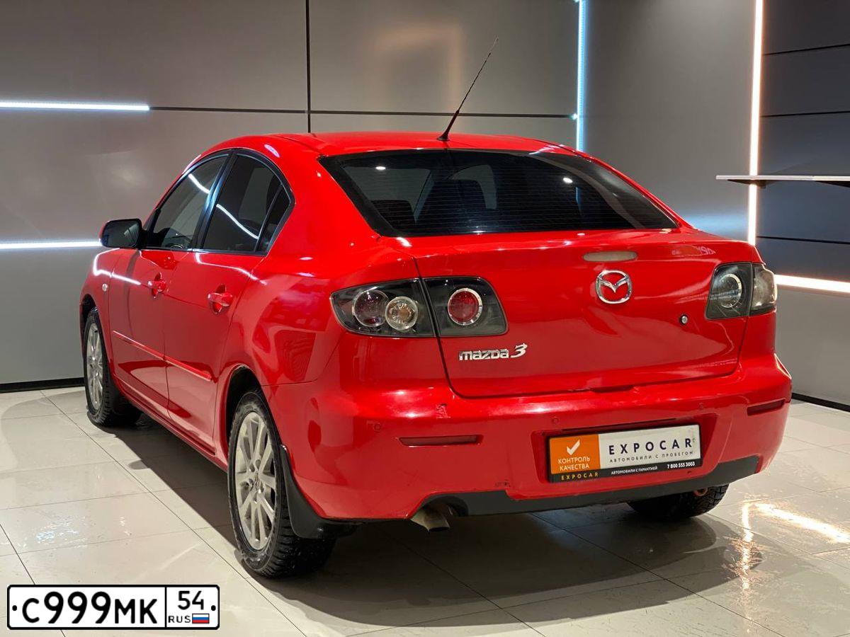 Фото автомобиля MAZDA 3, 2008 — госномер Т286КВ154. Цвет: КРАСНЫЙ