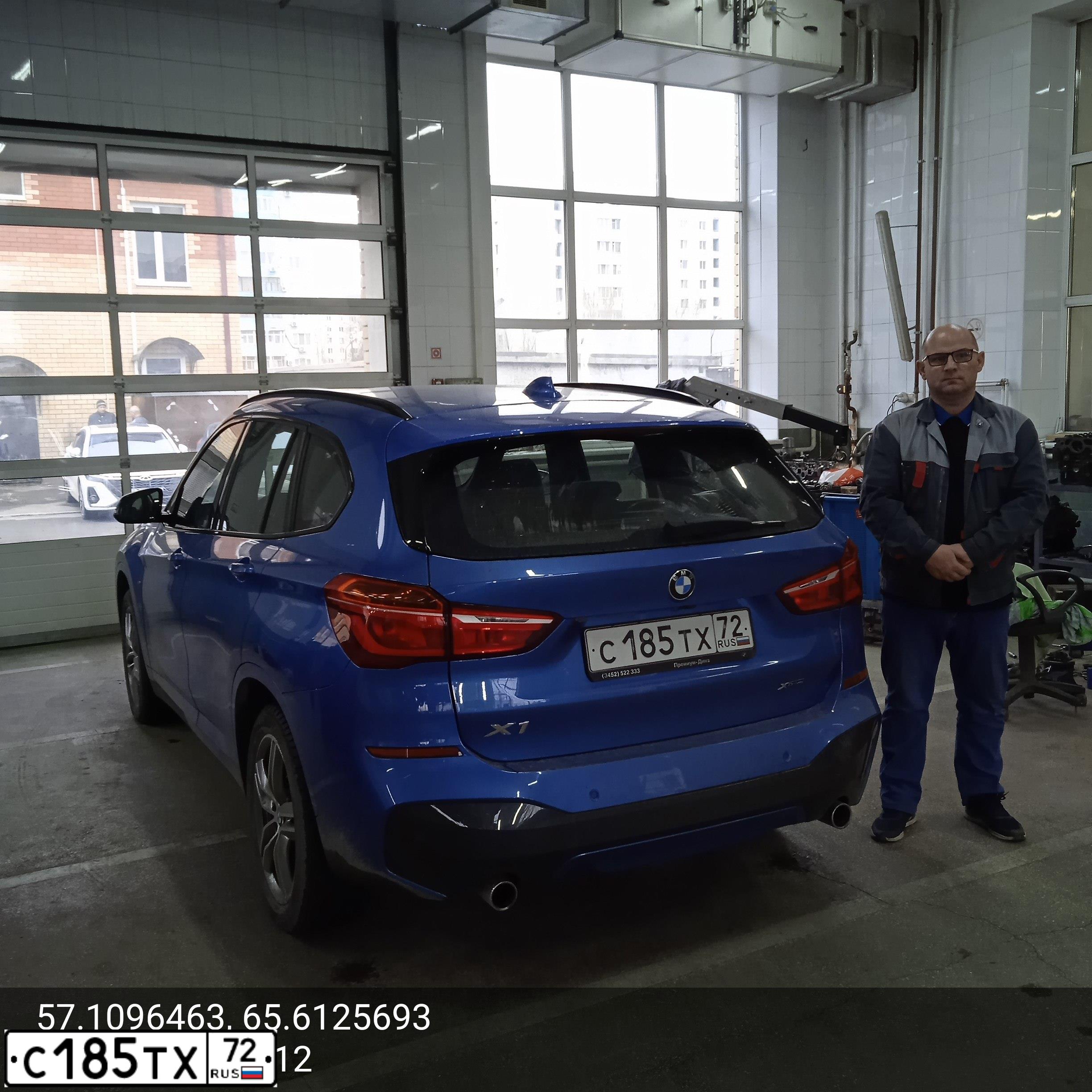 Фото автомобиля BMW X1, 2018 — госномер С185ТХ72. Цвет: СИНИЙ