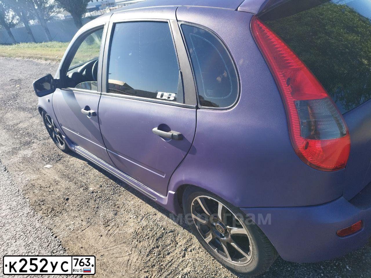 Фото автомобиля LADA 1119 KALINA, 2006 — госномер В128МС163. Цвет: СИНЕ-ФИОЛЕТОВЫЙ
