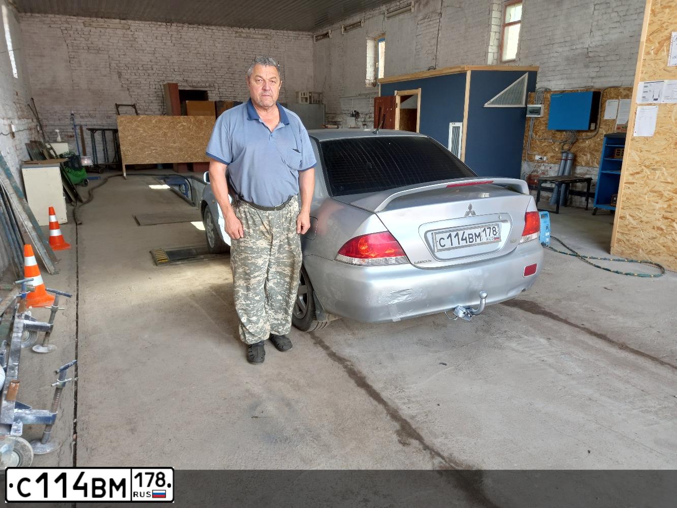Фото автомобиля MITSUBISHI LANCER, 2006 — госномер В565ОН53. Цвет: Серебристый