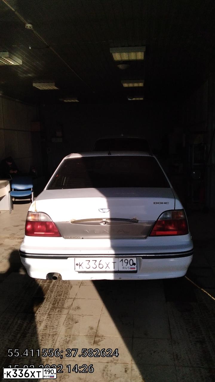 Фото автомобиля DAEWOO NEXIA, 2006 — госномер Х483РР197. Цвет: Белый