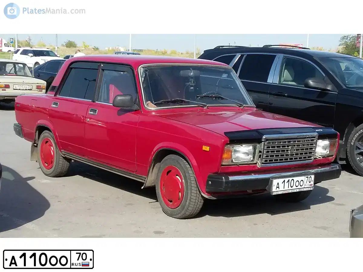 Фото автомобиля LADA 2107, 1998 — госномер Н851УЕ70. Цвет: ТЕМНО-КРАСНЫЙ