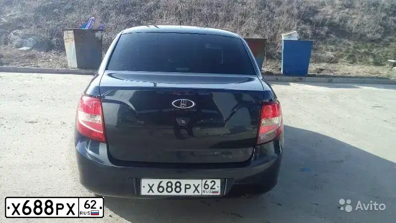 Фото автомобиля LADA 2190 GRANTA, 2013 — госномер Х104ЕА761. Цвет: СЕРО-СИНИЙ