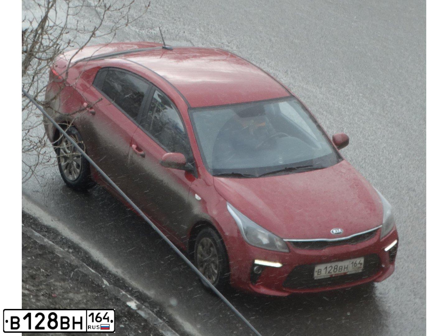 Фото автомобиля KIA RIO, 2018 — госномер В128ВН164. Цвет: Красный
