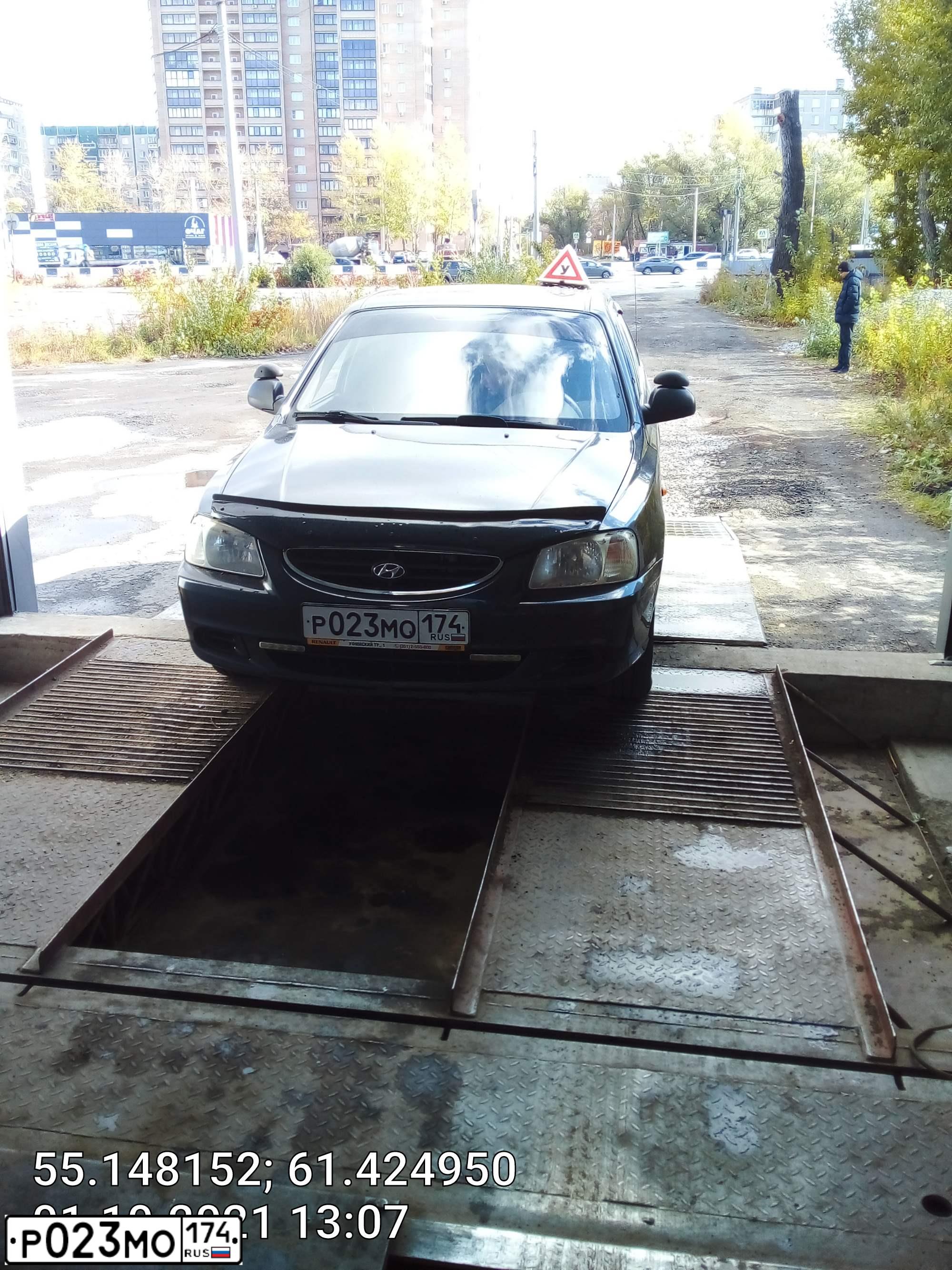 Фото автомобиля TAGAZ Z ACCENT, 2009 — госномер Р023МО174. Цвет: ЧЕРНЫЙ