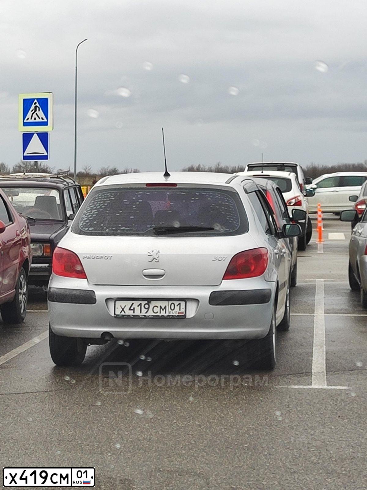 Фото автомобиля PEUGEOT 307, 2004 — госномер Х419СМ01. Цвет: Серебристый