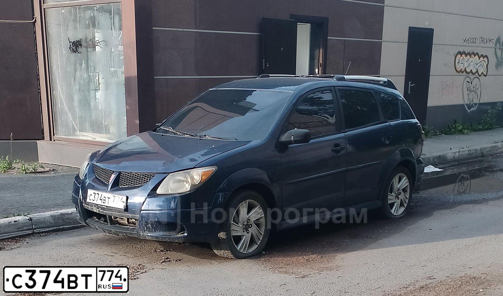 Фото автомобиля PONTIAC C VIBE, 2003 — госномер С374ВТ774. Цвет: синий