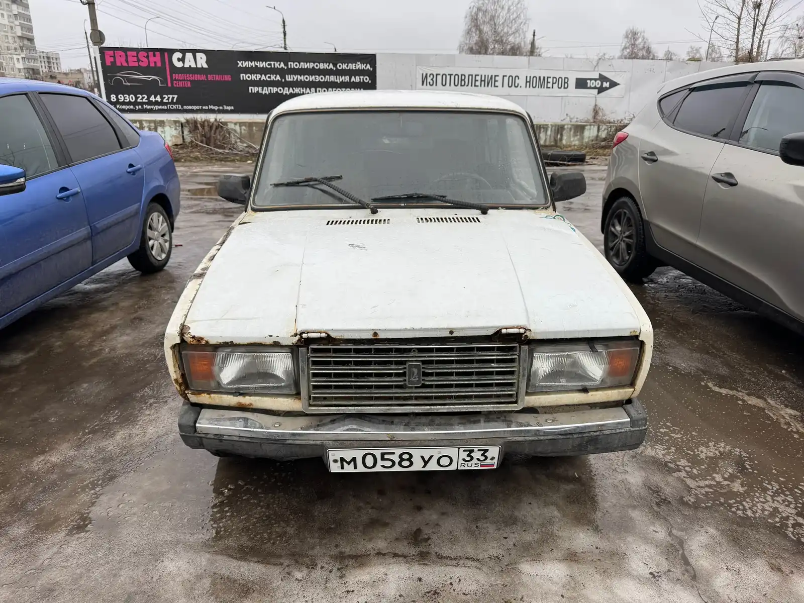 Фото автомобиля LADA 2107 LADA, 2004 — госномер М058УО33. Цвет: Белый