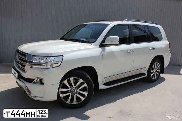 Фото автомобиля TOYOTA LAND CRUISER 200, 2016 — госномер Т001ЕВ193. Цвет: Белый