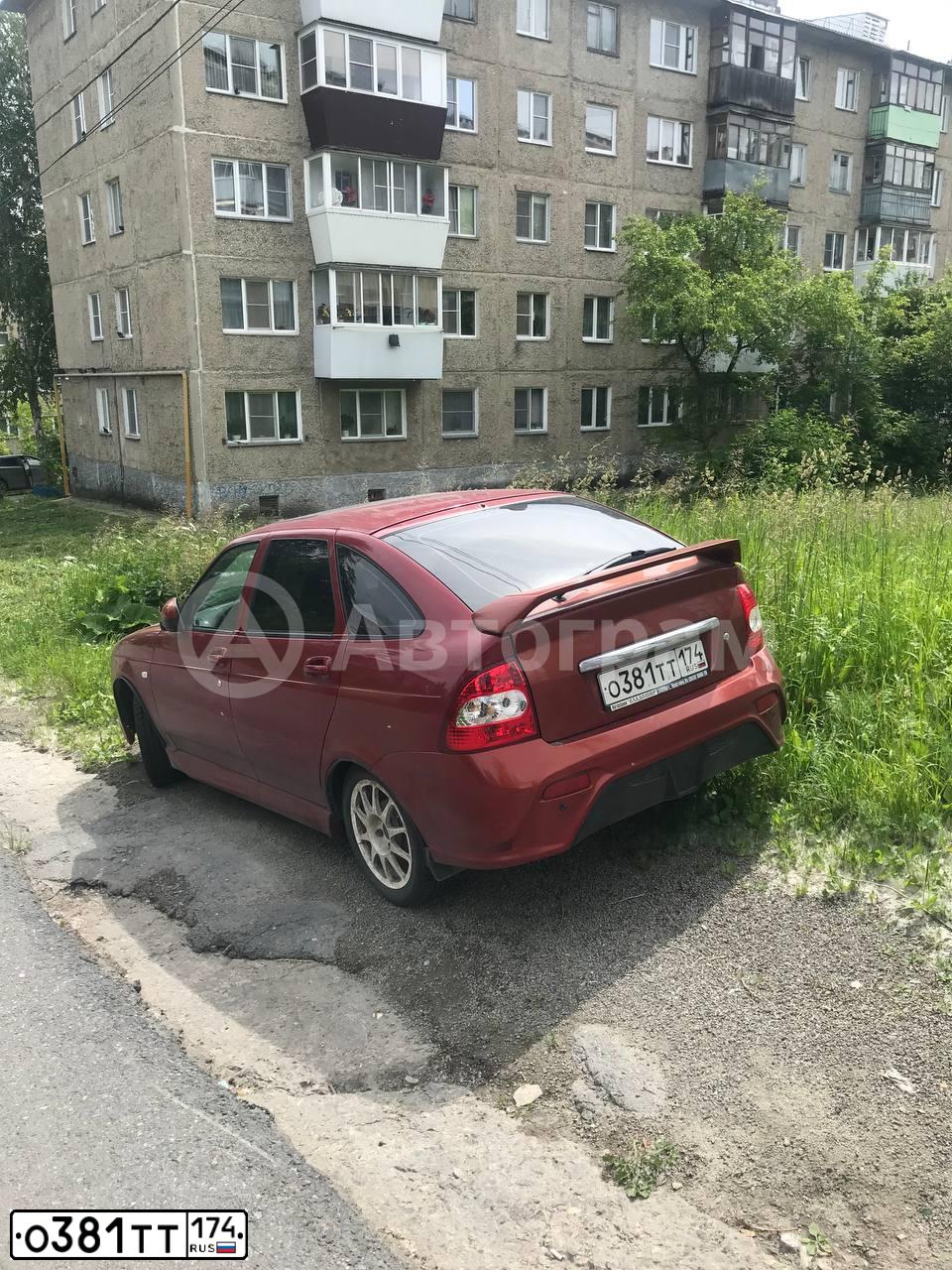 Фото автомобиля LADA 2172 PRIORA, 2008 — госномер О381ТТ174. Цвет: ЗОЛОТИСТО-КРАСНЫЙ