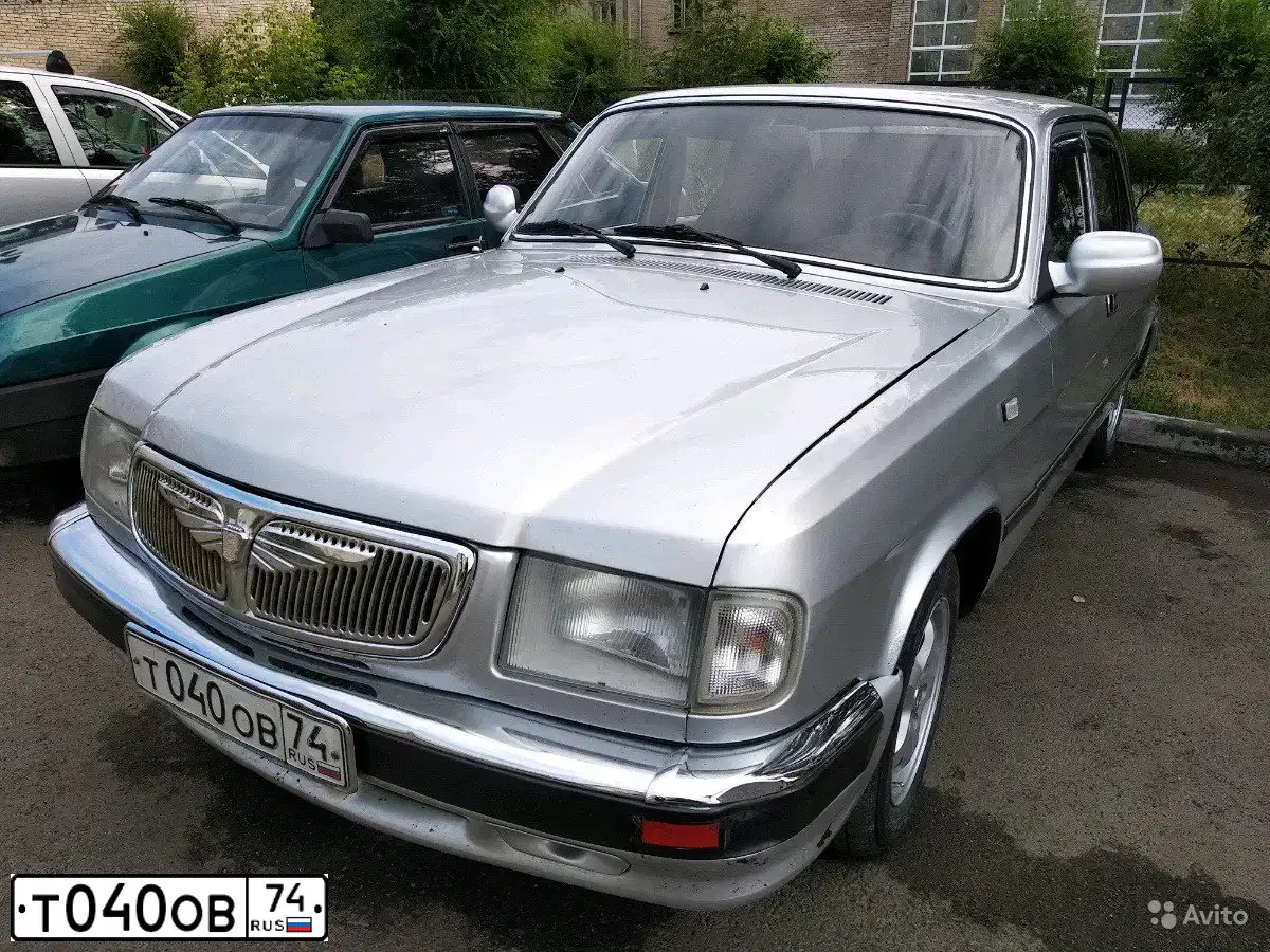 Фото автомобиля GAZ 3110 WOLGA, 2002 — госномер Т040ОВ74. Цвет: БУРАН