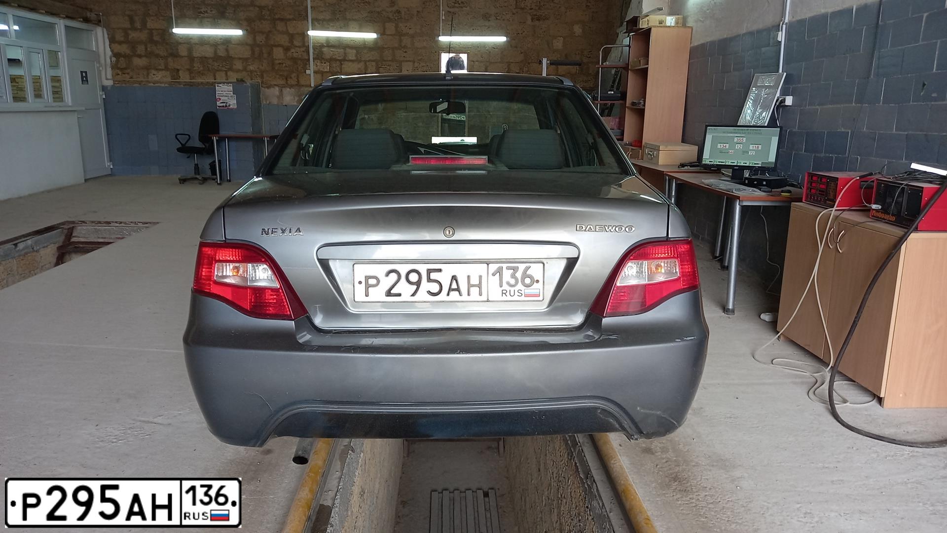 Фото автомобиля DAEWOO NEXIA, 2013 — госномер С141АН36. Цвет: темно-серый