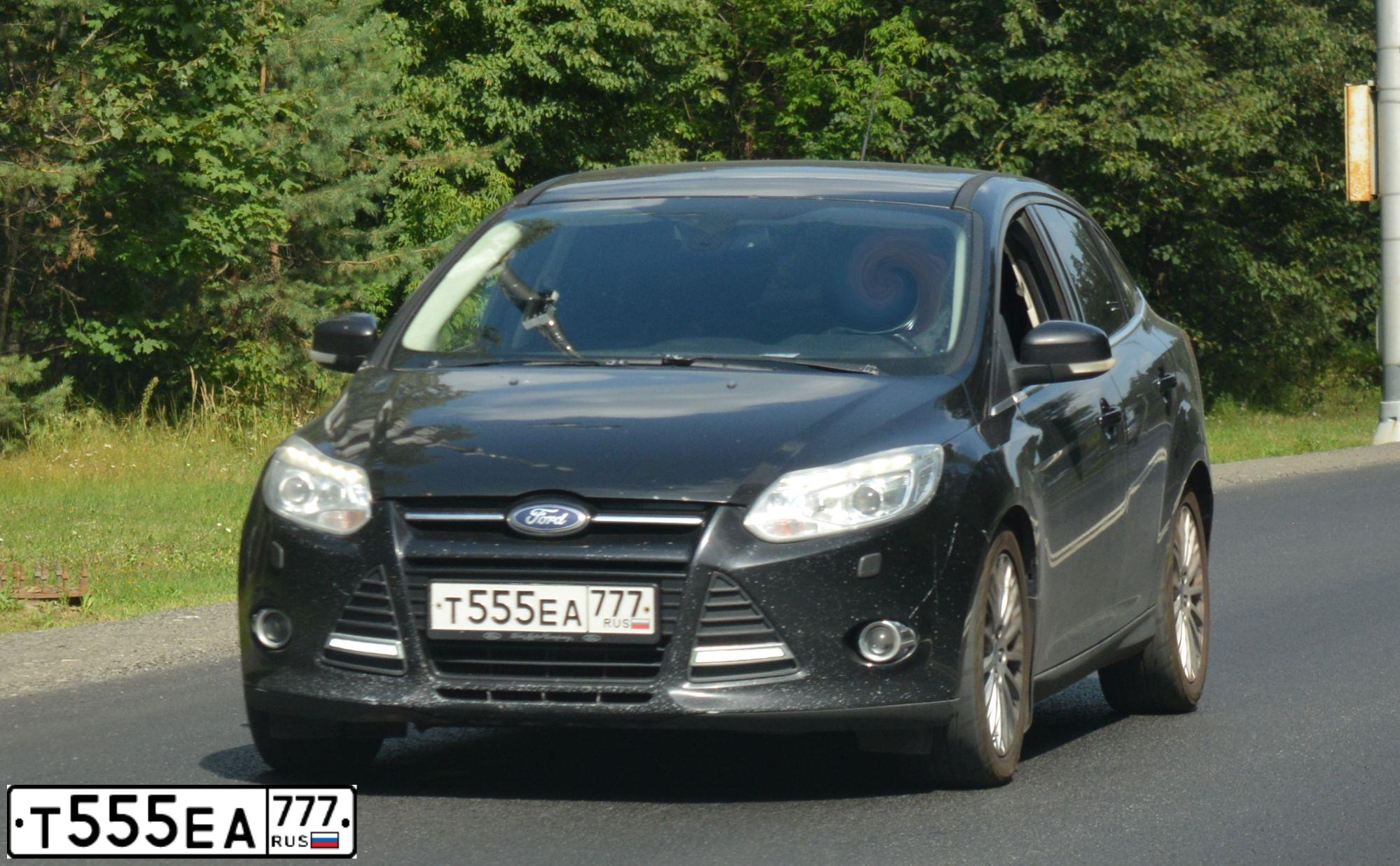 Фото автомобиля FORD FOCUS, 2012 — госномер Т555ЕА777. Цвет: ЧЕРНЫЙ