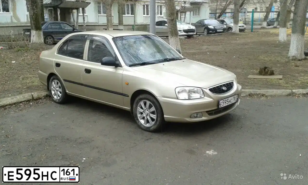 Фото автомобиля TAGAZ ACCENT, 2006 — госномер Е595НС161. Цвет: БЕЖЕВЫЙ