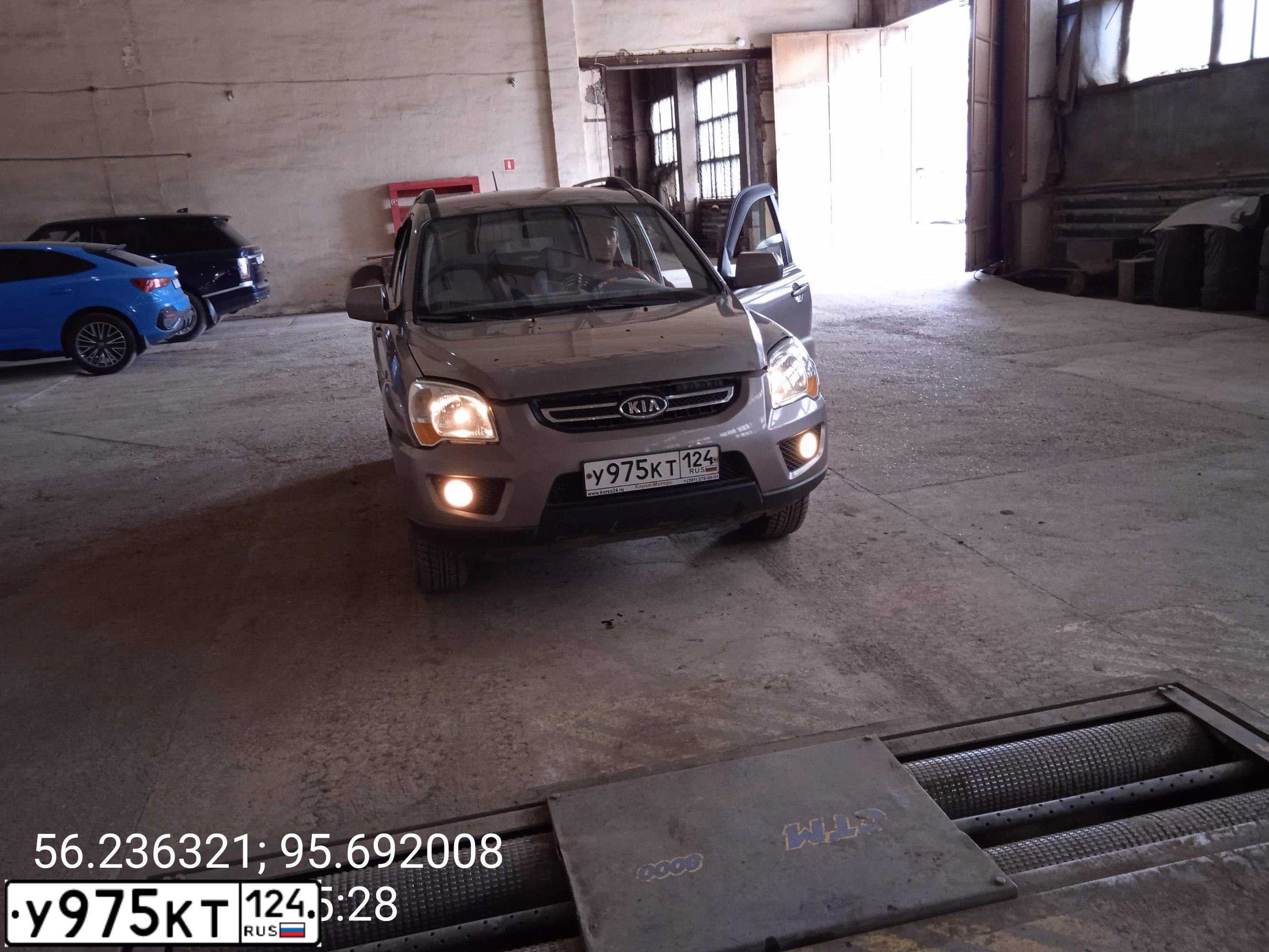 Фото автомобиля KIA SPORTAGE, 2009 — госномер Р010ВА21. Цвет: БЕЖЕВЫЙ