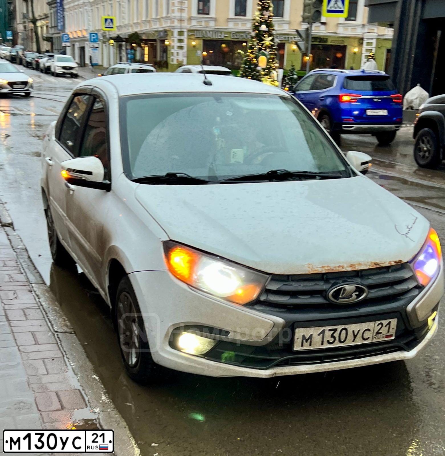 Фото автомобиля LADA 2190 GRANTA, 2019 — госномер М130УС21. Цвет: Белый