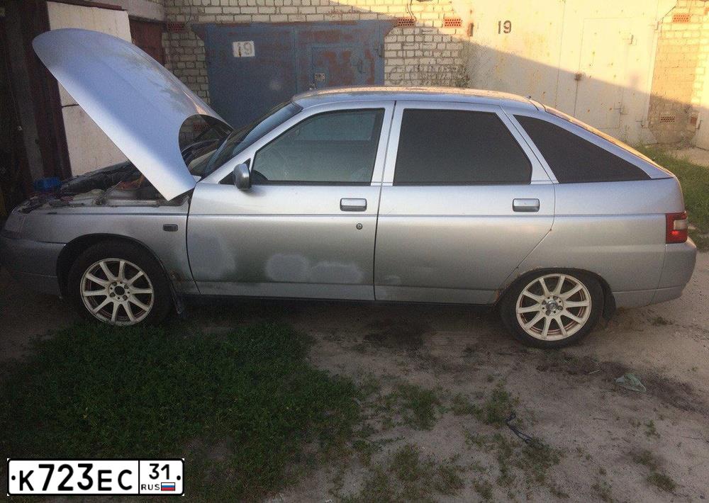 Фото автомобиля LADA 2112 LADA, 2006 — госномер К723ЕС31. Цвет: СВЕТЛО СЕРЕБРИСТЫЙ МЕТАЛЛ