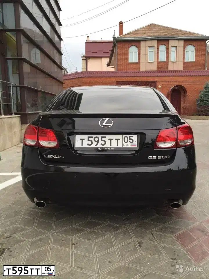 Фото автомобиля LADA PRIORA, 2014 — госномер Х584ТН05. Цвет: Сине-Черный
