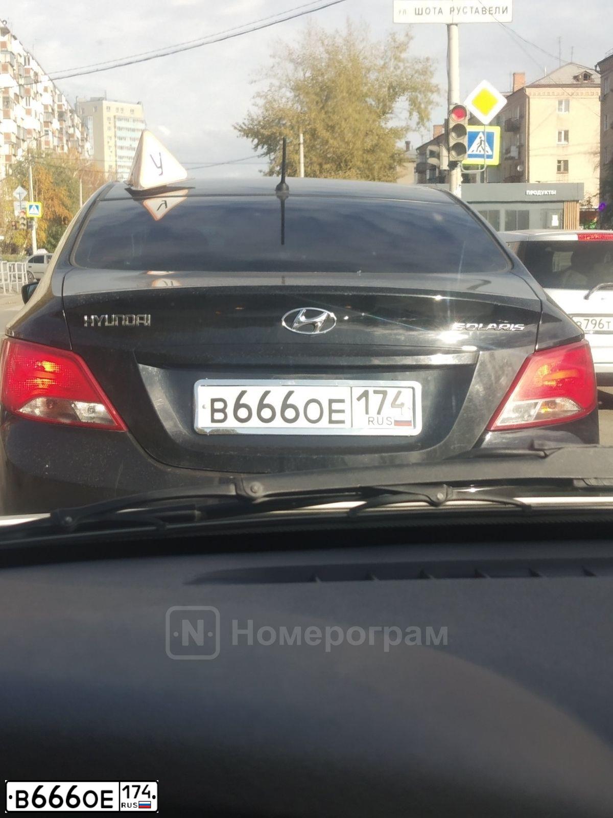 Фото автомобиля HYUNDAI SOLARIS, 2014 — госномер В666ОЕ174. Цвет: ЧЕРНЫЙ