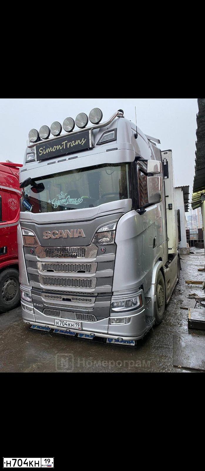 Фото автомобиля SCANIA SERIE G /8X4/, 2018 — госномер Н704КН19. Цвет: СЕРЕБРИСТЫЙ