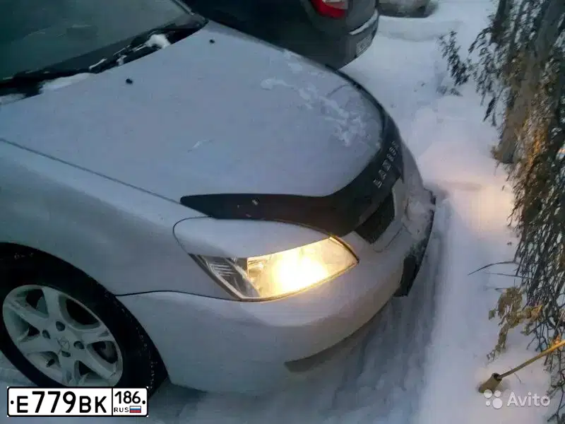 Фото автомобиля MITSUBISHI LANCER, 2009 — госномер С084ОТ72. Цвет: СЕРЕБРИСТЫЙ