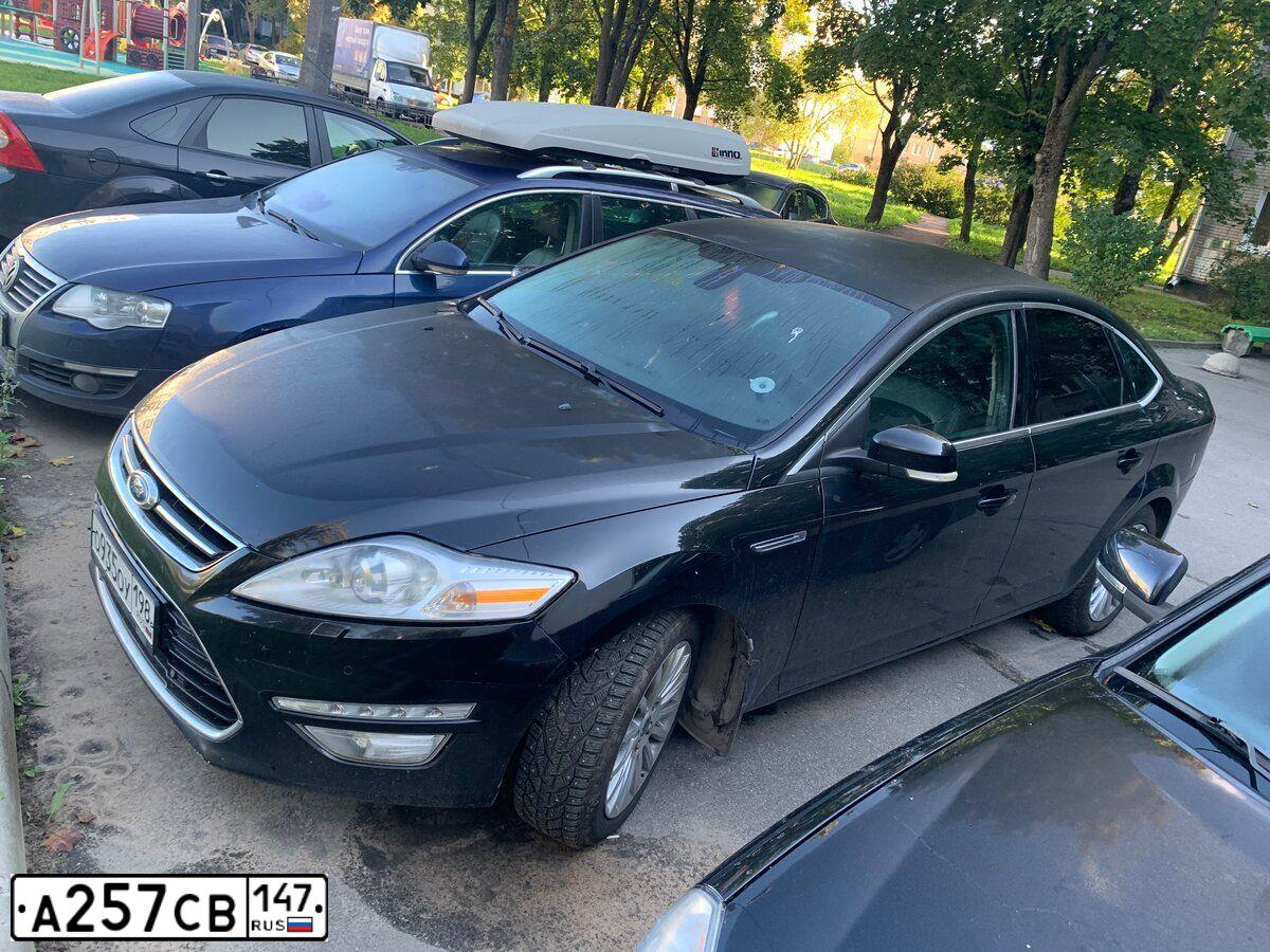 Фото автомобиля FORD MONDEO, 2010 — госномер М002ЕТ197. Цвет: ЧЕРНЫЙ