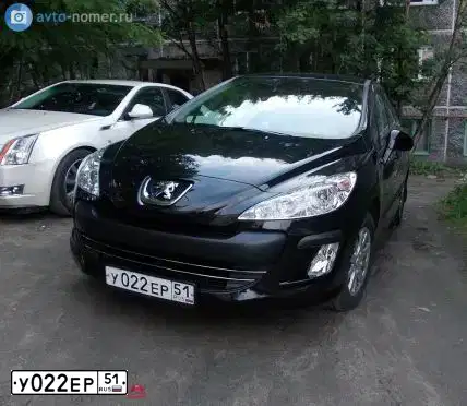 Фото автомобиля PEUGEOT 308, 2010 — госномер М056МС51. Цвет: ЧЕРНЫЙ