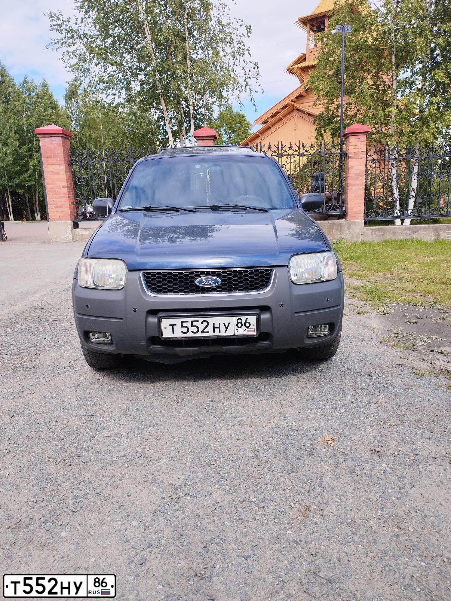 Фото автомобиля FORD MAVERICK, 2002 — госномер Т552НУ86. Цвет: ТЕМНО СИНИЙ