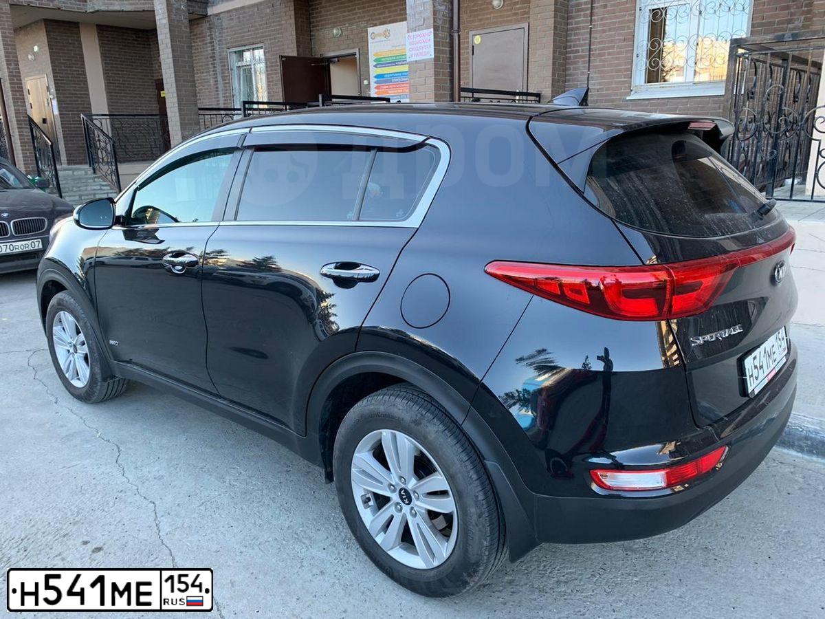 Фото автомобиля KIA SPORTAGE, 2018 — госномер К929НО154. Цвет: ЧЕРНЫЙ ПЕРЛАМУТР