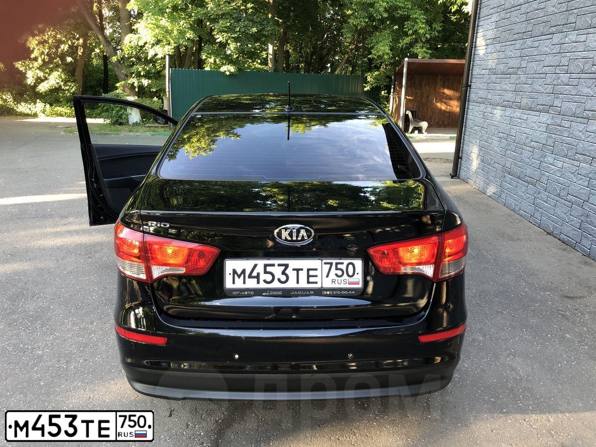Фото автомобиля KIA RIO, 2015 — госномер М453ТЕ750. Цвет: ЧЕРНЫЙ