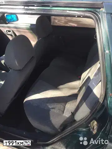 Фото автомобиля LADA 2111, 2003 — госномер Т991КМ161. Цвет: Темно-зеленый