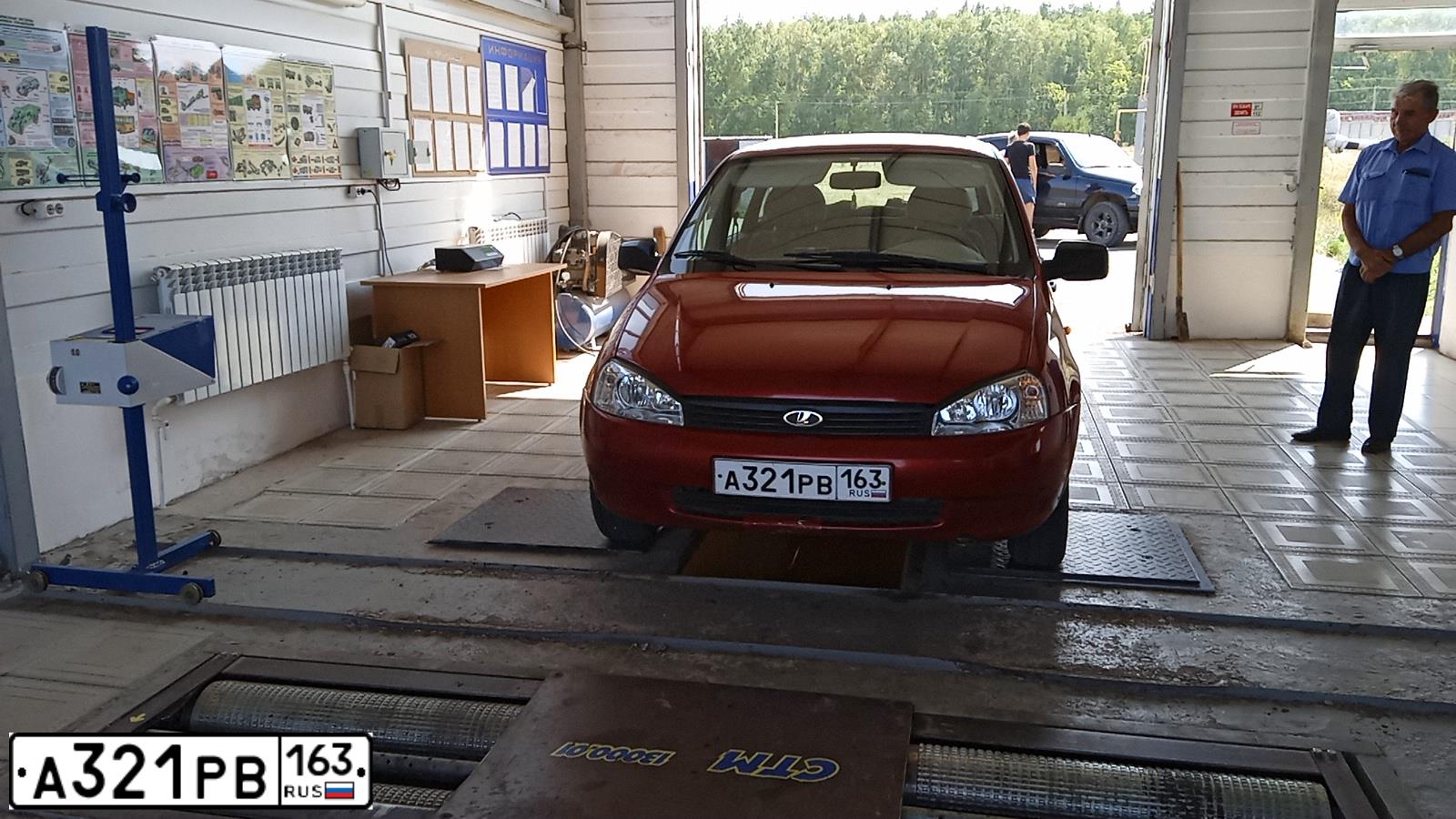Фото автомобиля LADA 1117 KALINA, 2009 — госномер А321РВ163. Цвет: СЕРЕБРИСТО-КРАСНЫЙ