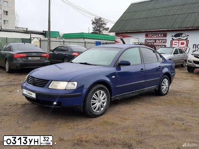 Фото автомобиля VOLKSWAGEN PASSAT, 1998 — госномер О365УК29. Цвет: синий