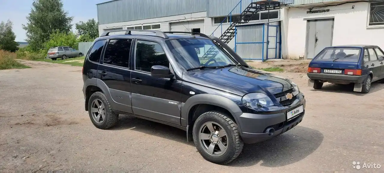 Фото автомобиля LADA 2109 SAMARA, 2006 — госномер С002КР62. Цвет: Серебристо-темно-синий