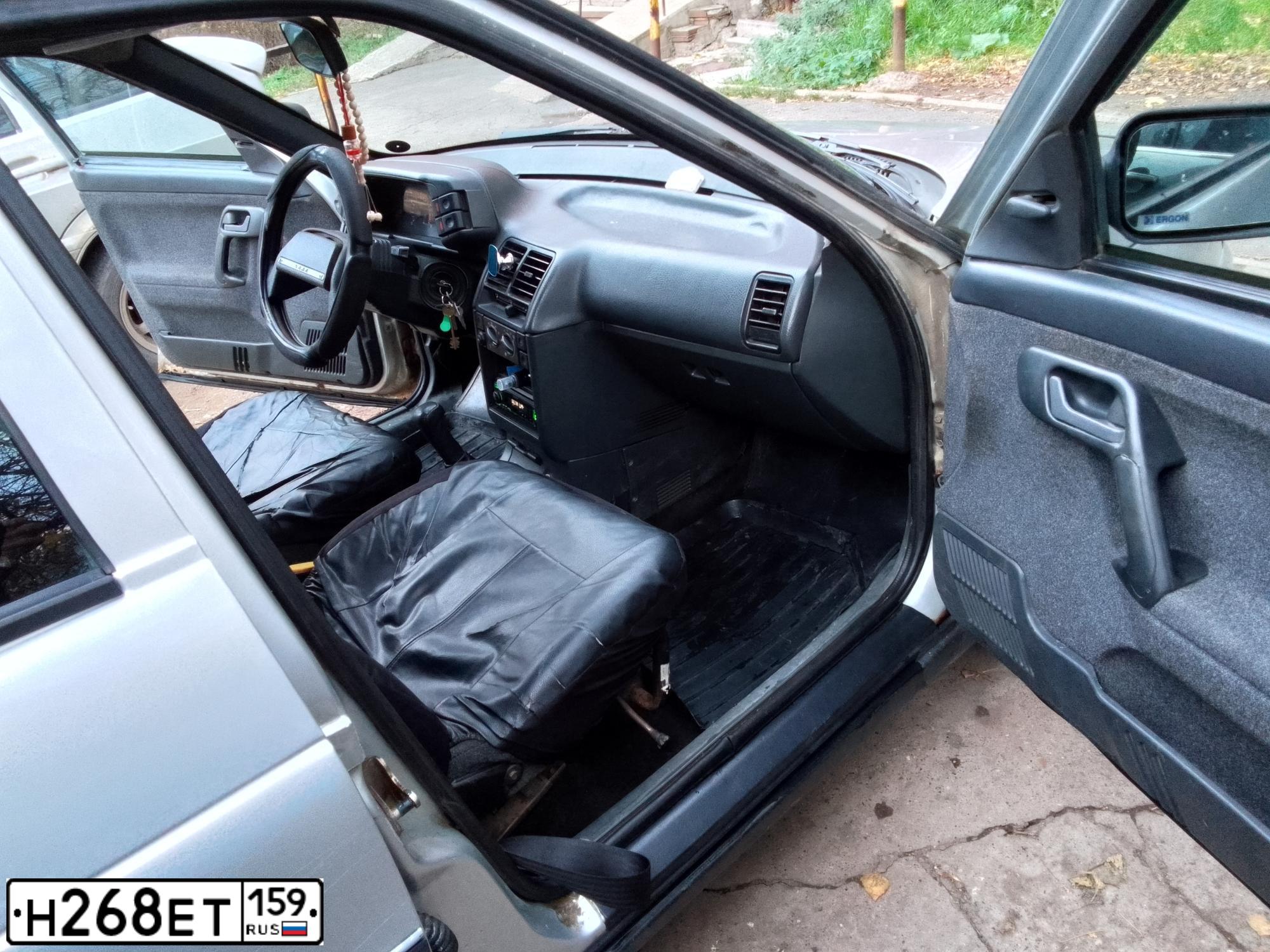 Фото автомобиля LADA 2111 LADA, 2003 — госномер Е100ЕА159. Цвет: Светло-серебристый металик