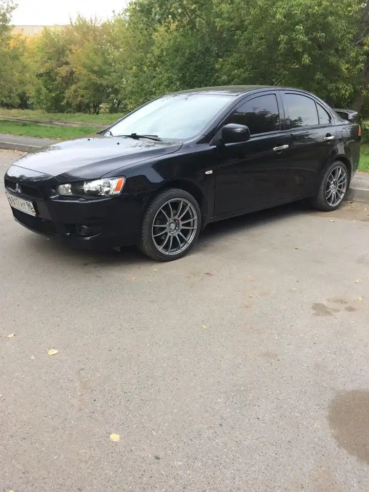 Фото автомобиля VOLKSWAGEN PASSAT, 2006 — госномер М338ОМ35. Цвет: ЧЕРНЫЙ