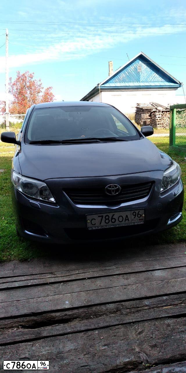 Фото автомобиля TOYOTA COROLLA, 2008 — госномер Р411МР45. Цвет: СЕРЫЙ