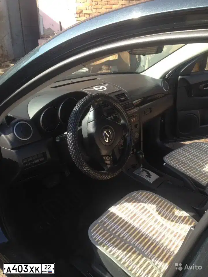 Фото автомобиля MAZDA 3, 2005 — госномер Т002АО177. Цвет: ЗЕЛЕНЫЙ