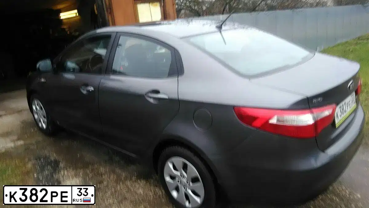 Фото автомобиля KIA RIO, 2015 — госномер Х576РР33. Цвет: ТЕМНО-СЕРЫЙ