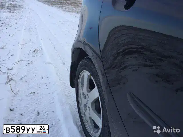 Фото автомобиля MITSUBISHI COLT, 2007 — госномер В158НЕ09. Цвет: ЧЕРНЫЙ