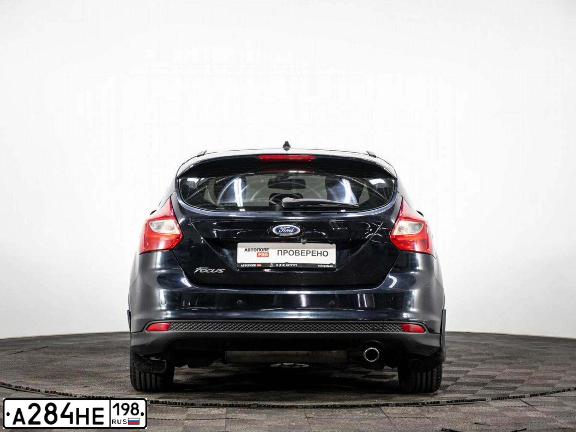 Фото автомобиля FORD FOCUS, 2012 — госномер А284НЕ198. Цвет: ЧЕРНЫЙ