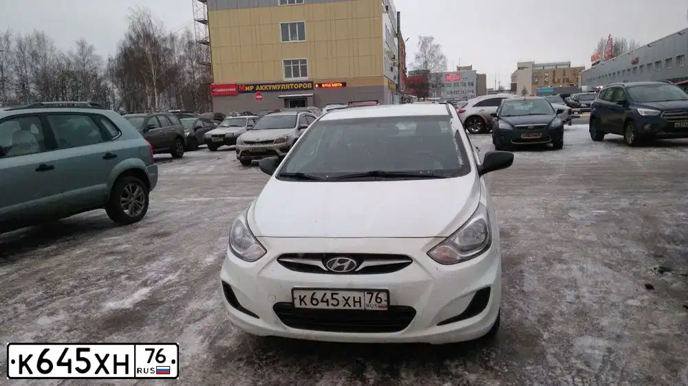 Фото автомобиля HYUNDAI SOLARIS, 2014 — госномер В452ВН37. Цвет: Белый