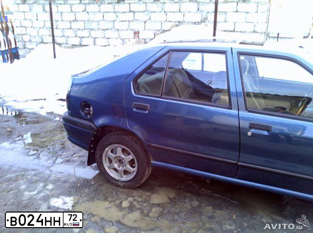 Фото автомобиля RENAULT R 19, 1993 — госномер В024НН72. Цвет: СИНИЙ
