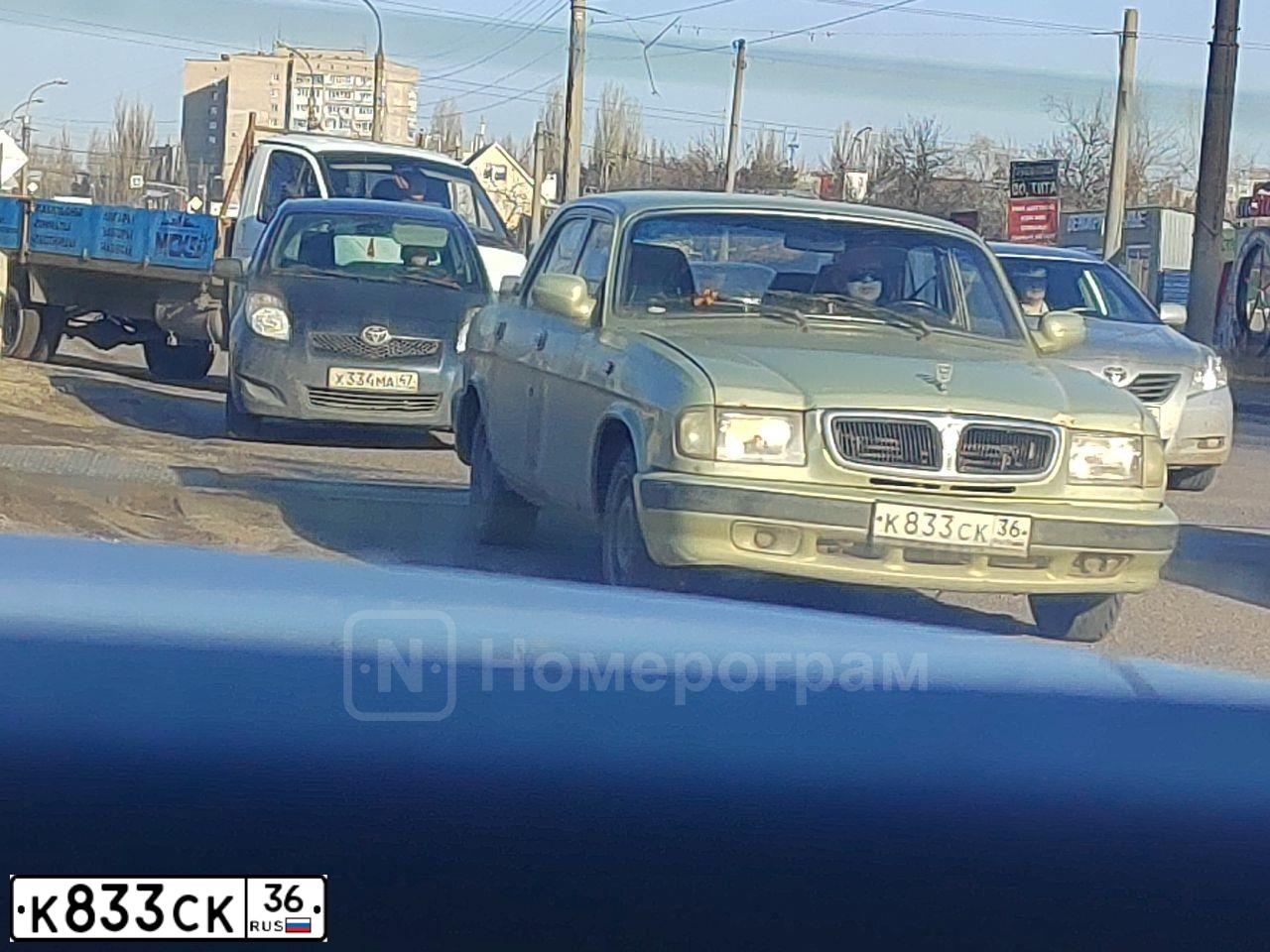Фото автомобиля GAZ 3110 WOLGA, 2003 — госномер К833СК36. Цвет: СВЕТЛО-ЗЕЛЕНЫЙ