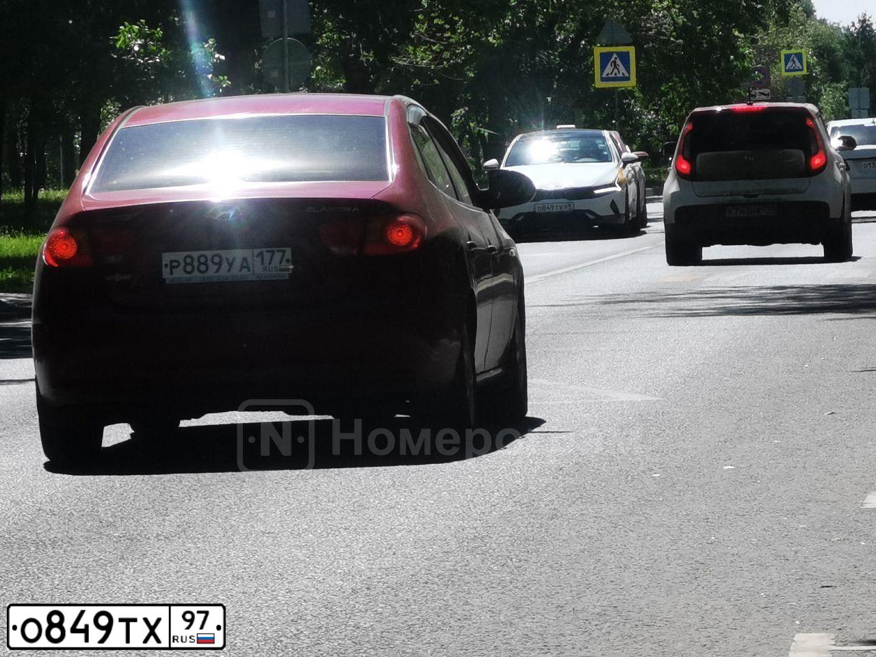 Фото автомобиля MITSUBISHI LANCER, 2004 — госномер О849ТХ97. Цвет: ЧЕРНЫЙ