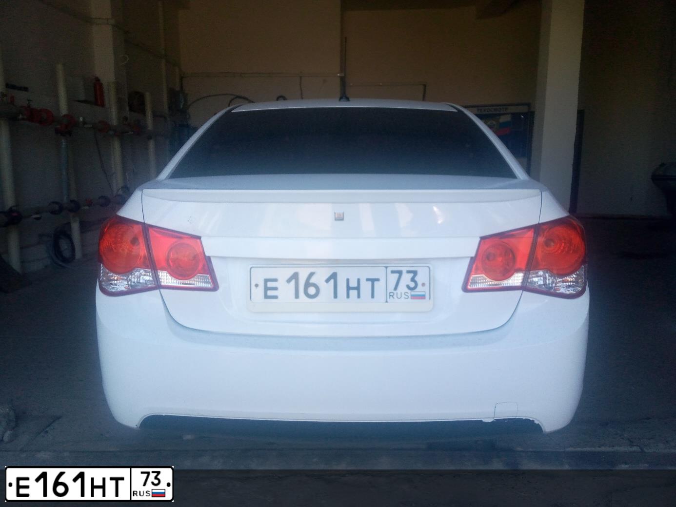 Фото автомобиля CHEVROLET CRUZE, 2012 — госномер Е161НТ73. Цвет: Белый